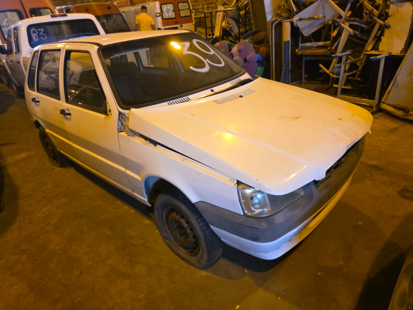 FIAT/UNO MILLE ECONOMY - PLACA: MOM-5403 - ANO/MODELO: 2009/2010 - CHASSI: 9BD15822AA6266100 - RENAVAM: 135686601 - COMBUSTÍVEL: ALCOOL/GASOLINA - COR: BRANCA
