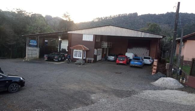 IMÓVEL ÁREA 8.041,23M², EDIFICADO UM GALPÃO DE 1.050,00M², IBICARÉ/SC